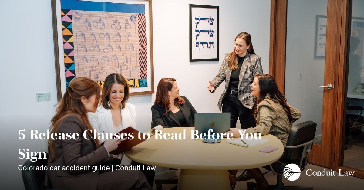 Conduit Law team meeting with a graphic titled 5 Release Clauses to Read Before You Sign, a checklist for Colorado car accident settlement releases