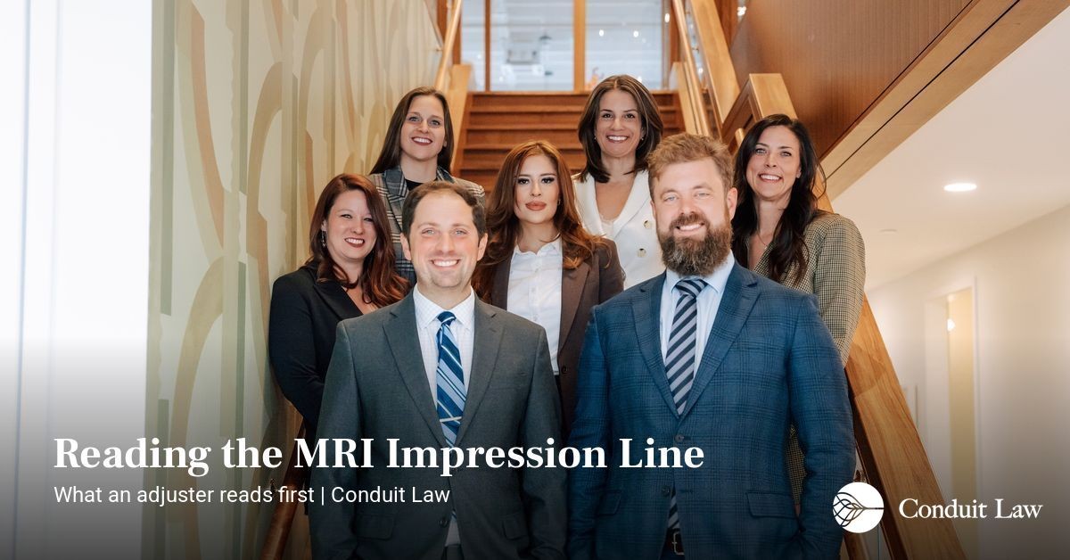 Conduit Law team on the office staircase beside a graphic titled Reading the MRI Impression Line, explaining what an adjuster reads first in a Colorado crash claim